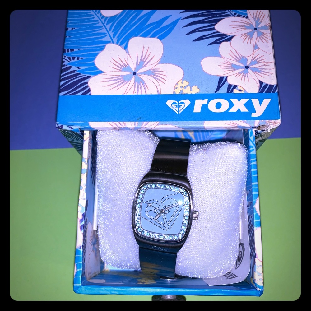 Never used, new in box, women’s Roxy watch.